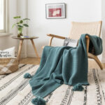 Warme wollen plaid in petroleumblauwe kleur